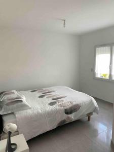 Posteľ alebo postele v izbe v ubytovaní Maison quetigny