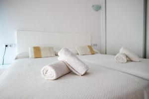 Postel nebo postele na pokoji v ubytování Sal Mar Suites