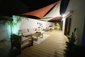 Posedenie v ubytovaní Mini Villa Indépendante à 350m de la mer (LAX)