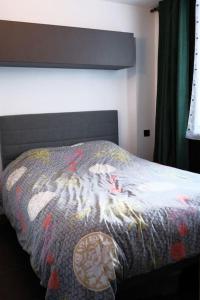 Postel nebo postele na pokoji v ubytování Val Claret, Tignes Appt cosy 5-6pers Location dimanche dimanche en saison