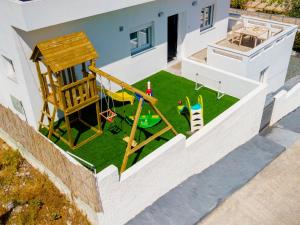 Herní místnost nebo prostor pro děti v ubytování Cactus Guesthouse, Κίνι Συρος