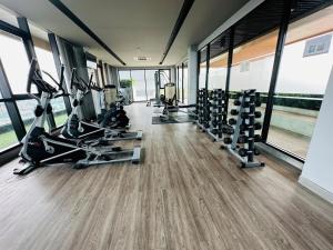 a gym with treadmills and elliptical machines at Plum Central Near shopping Mall @ Bangyai in Nonthaburi