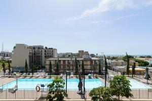 Gallery image of Bright & Chic Condo with Pool & Unique View by FeelHome in Tel Aviv