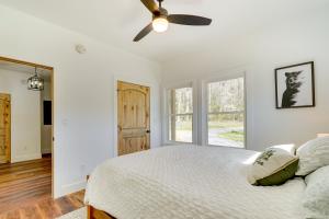A bed or beds in a room at Modern Appalachian Vacation Rental with River Access