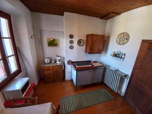 Kuchyň nebo kuchyňský kout v ubytování ANTICA CASA AL LAGO