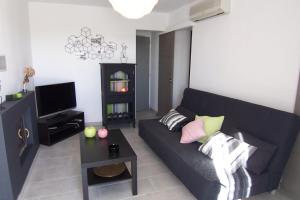 Χώρος καθιστικού στο Appartement Chiola-Plage à pieds-clim