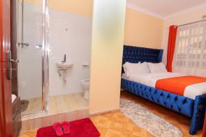 Postel nebo postele na pokoji v ubytování Cherry Homes