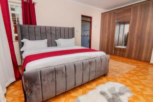 Postel nebo postele na pokoji v ubytování Cherry Homes