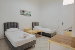 Ένα ή περισσότερα κρεβάτια σε δωμάτιο στο Hotel CasaMia