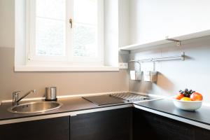 Kuchyňa alebo kuchynka v ubytovaní Apartments Rynek Glowny