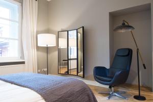 Posteľ alebo postele v izbe v ubytovaní Apartments Rynek Glowny
