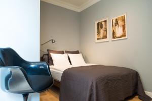 Posteľ alebo postele v izbe v ubytovaní Apartments Rynek Glowny