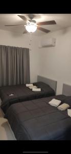Postel nebo postele na pokoji v ubytování Cape Coral Residence