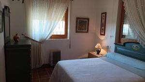Posteľ alebo postele v izbe v ubytovaní Finca Cerro del Moro