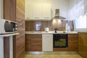 Kuchyň nebo kuchyňský kout v ubytování Apartmani Justić