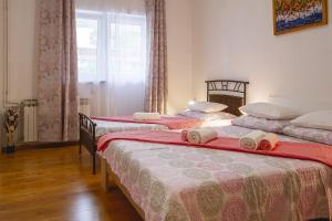 Postel nebo postele na pokoji v ubytování Apartmani Justić