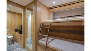 a room with two bunk beds and a toilet at MERMAID in Bodrum City