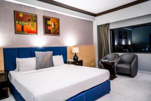 Letto o letti in una camera di Hotel Pal Heights