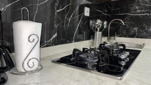 Kuchyň nebo kuchyňský kout v ubytování Suna' a Home Bonapriso
