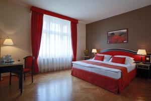 Posteľ alebo postele v izbe v ubytovaní Elysee Hotel
