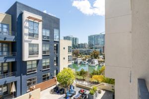 a view of a river from a building at Mission Bay 2BR w Gym WD nr Caltrain Muni SFO-837 in San Francisco