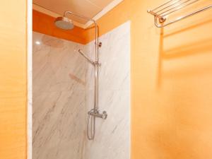 a shower in a bathroom with a white marble floor at NICE HOUSE in VILA VELLA TOSSA DE MAR in Tossa de Mar +32 photos