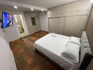 Voodi või voodid majutusasutuse Hotel Valle Central toas