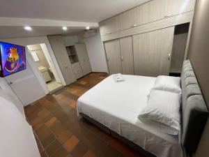 Voodi või voodid majutusasutuse Hotel Valle Central toas