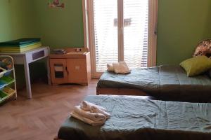 Posteľ alebo postele v izbe v ubytovaní Casa Etna