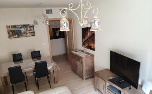 Telewizja i/lub zestaw kina domowego w obiekcie On the beach! Frente al Paseo Marítimo, Parking y Piscina