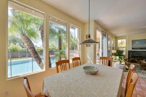 a dining room with a table with a bowl on it at Luxury Encinitas Vacation Rental with Private Pool in Encinitas