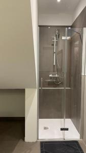 A bathroom at API Tenna Apartments Glicine 1