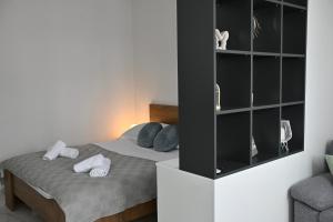 Postel nebo postele na pokoji v ubytování Golden Neretva apartments
