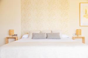 Postel nebo postele na pokoji v ubytování Eco-Hotel Doña Mayor