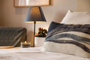 Postel nebo postele na pokoji v ubytování Eco-Hotel Doña Mayor