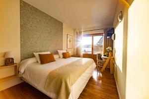 Postel nebo postele na pokoji v ubytování Eco-Hotel Doña Mayor