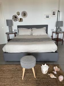 En eller flere senge i et værelse på bella vista Villasimius