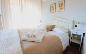 Postel nebo postele na pokoji v ubytování B&B Greco Home