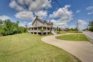 a house on the side of a road at Spacious Lake Charles Craftsman - Pet Friendly! in Lake Charles