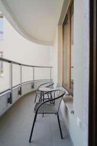 Balkon lub taras w obiekcie TOTU HOME Garnizon Apartament Hemara 11