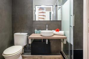 Koupelna v ubytování Le Sable d'Or + 12 fotografií