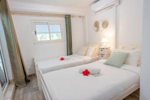 Postel nebo postele na pokoji v ubytování Le Sable d'Or