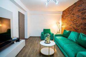 O zonă de relaxare la ApartBnb Green Vibe 32