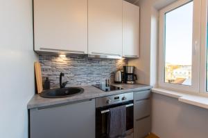 Η κουζίνα ή μικρή κουζίνα στο Stylish Central Apartments by Kuus Sõlme