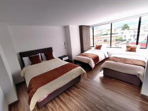 Hotel Basan Plaza客房内的一张或多张床位