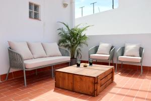 Posezení v ubytování La Plaza Hostal