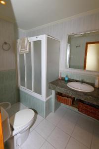 Koupelna v ubytování The Mare House abierto a estancias medias