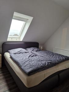Katil atau katil-katil dalam bilik di Ferienwohnung Wellenbrecher