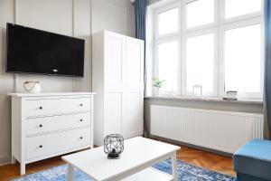 TV a/nebo společenská místnost v ubytování Blich Apart