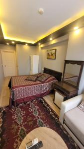 Postel nebo postele na pokoji v ubytování MEHMET BEY HOTEL